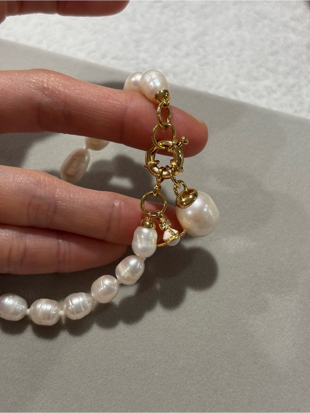 Vivienne Westwood White Pearl Bracelet with Gold Charm - Picture 4 of 10